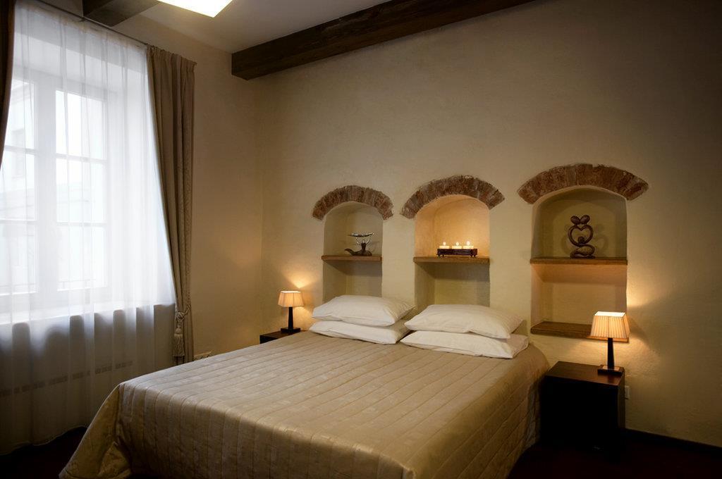 Amberton Cozy Hotel Kaunas Quarto foto