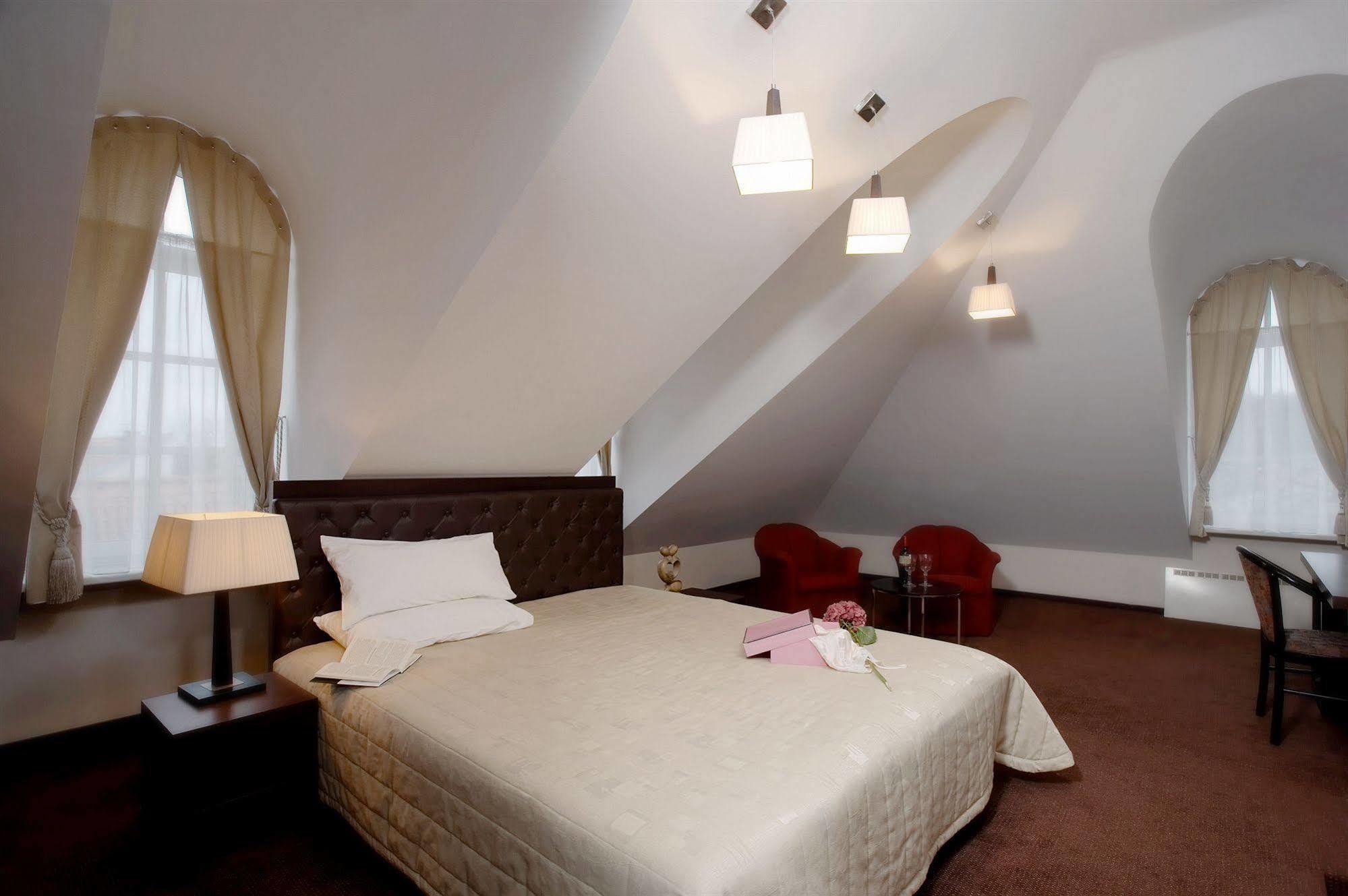 Amberton Cozy Hotel Kaunas Quarto foto
